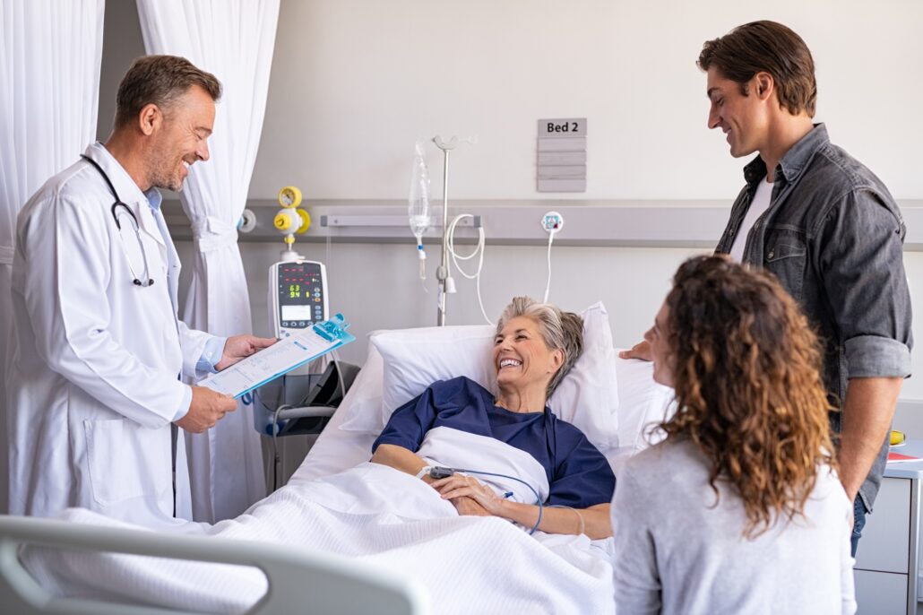 Doctor visiting senior patient with family