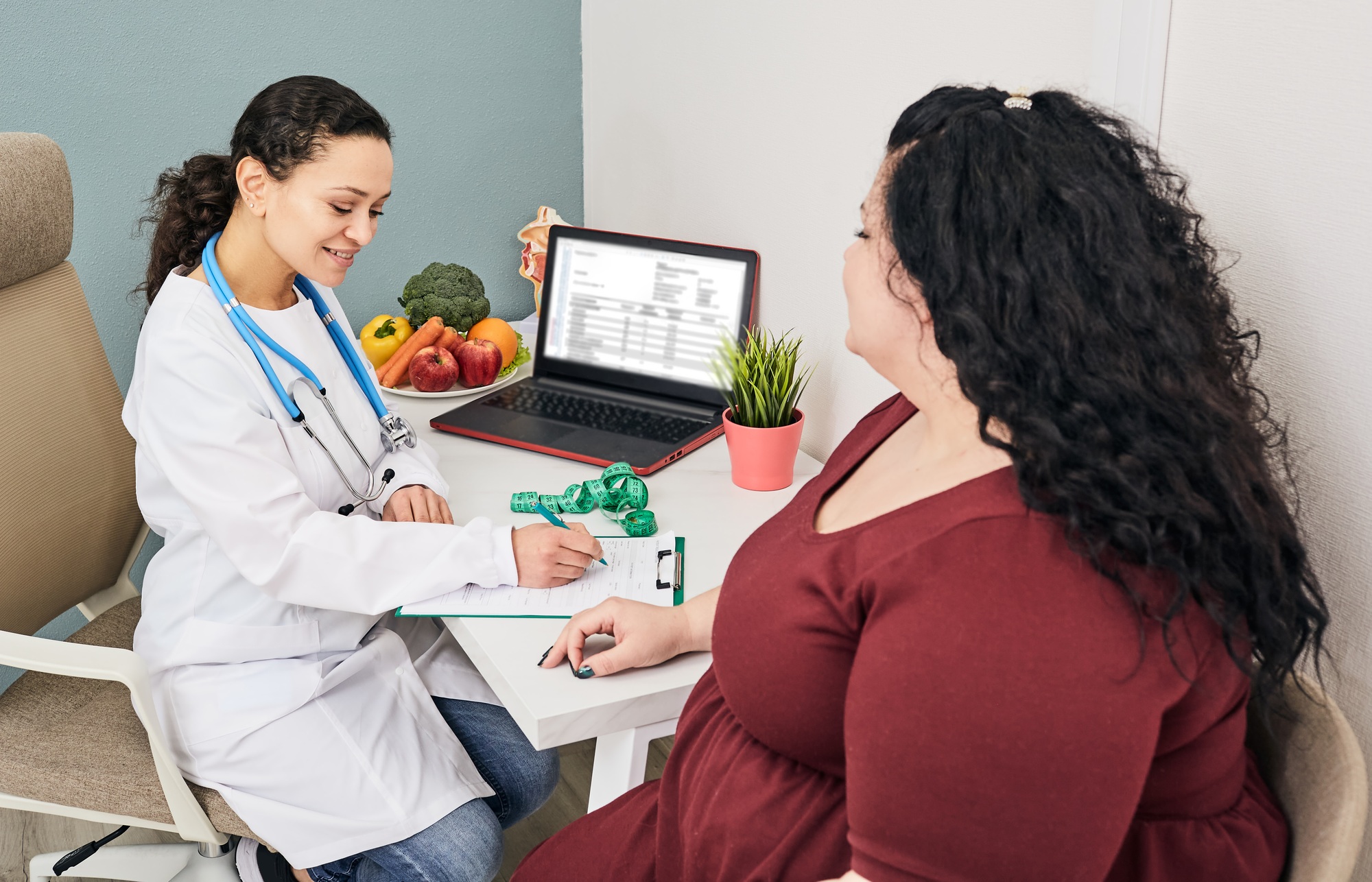 Obesity, unhealthy weight. Nutritionist calculating body mass index of fat woman for obesity